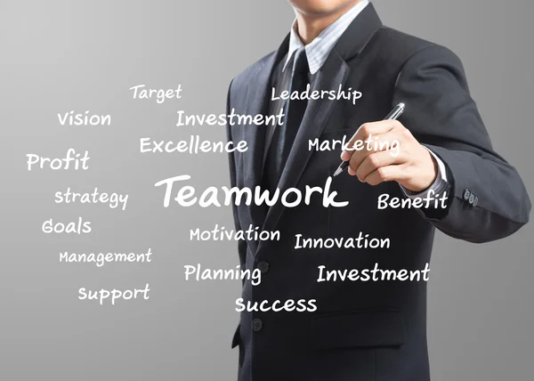 Business man writing Teamwork — Stock Photo, Image