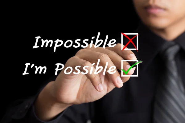 Mano masculina escribiendo "Soy posible" en una pizarra — Foto de Stock