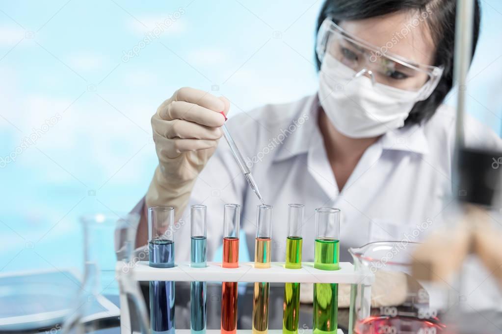 Female scientist researching in laboratory