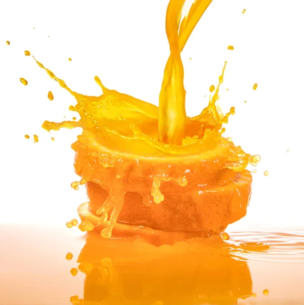 Šplouchání pomerančové šťávy — Stock fotografie