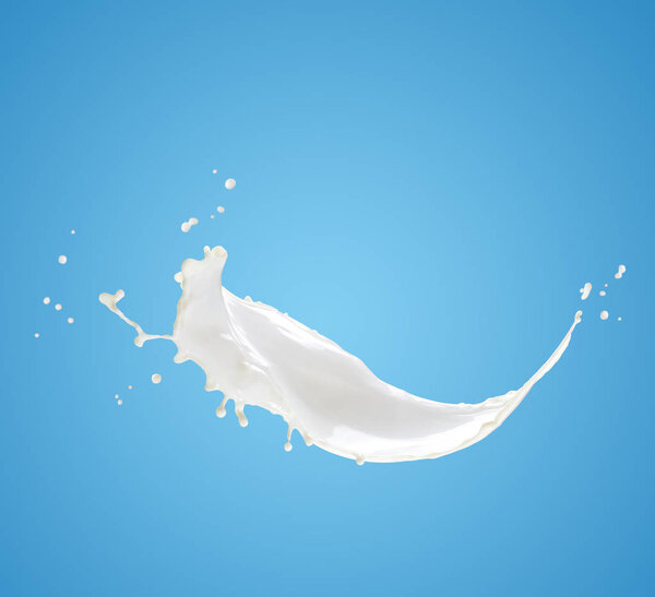 milk splash on blue background