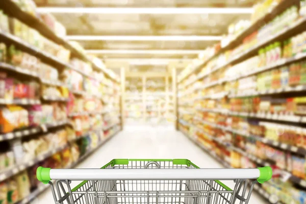 Abstract blurred photo of store with trolley in department store bokeh background — Stock Photo, Image