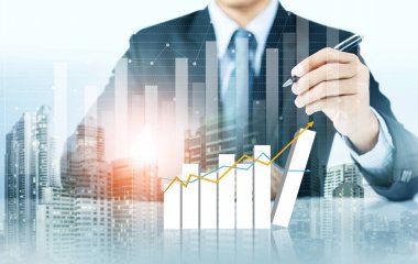 İşadamı yazma artan grafik şehir arka plan, iş büyüme ile