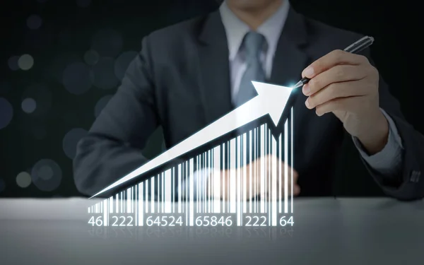 Zakenman trekken steeds meer grafiek met barcode, bedrijfsgroei — Stockfoto