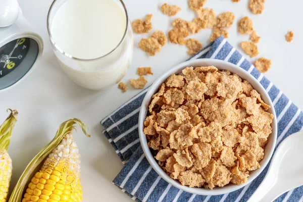 Healthy Corn Flakes with milk for Breakfast on table