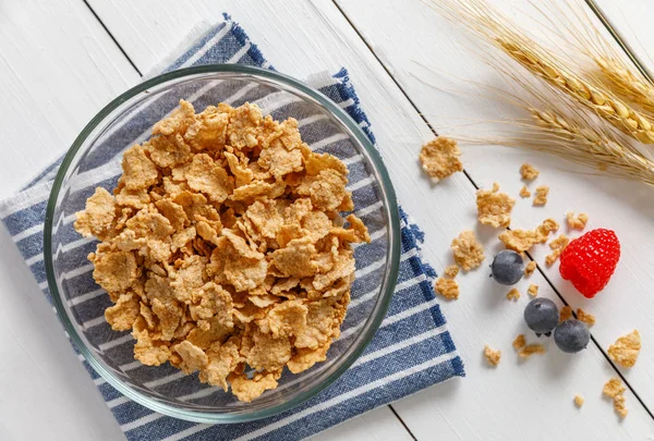 Healthy Corn Flakes with milk for Breakfast on table, food and drink