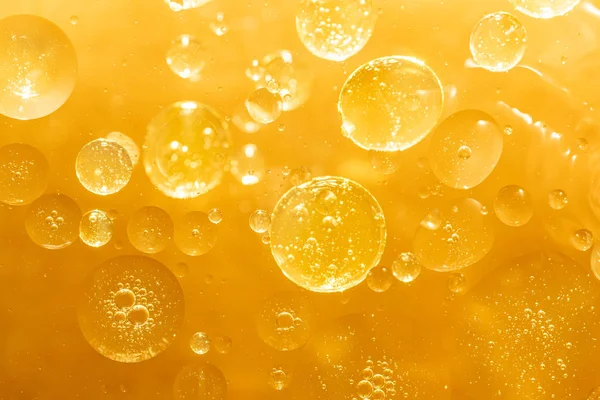 Gouden Gele Bellenolie Serum Abstract Gele Waterbellen Achtergrond — Stockfoto