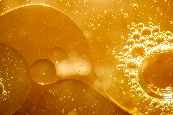 Gouden Gele Bellenolie Serum Abstract Gele Waterbellen Achtergrond — Stockfoto