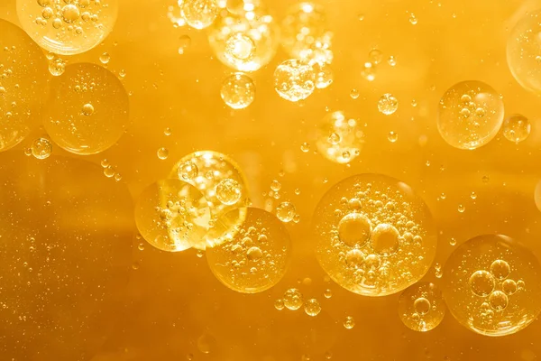 Golden Yellow Bubble Oil Droplet Abstract Background Royalty Free Stock Photos