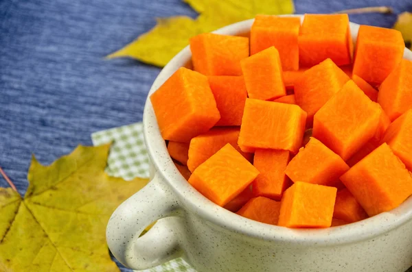 Fresh and juicy slices of pumpkin in a pot — Stock Photo, Image