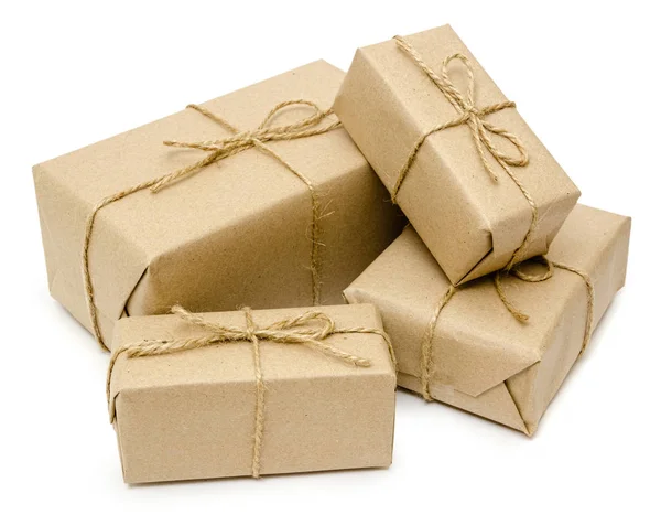 Gift wrapping from Kraft paper wrapped with twine — Stock Photo, Image