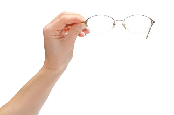 Hand of young girl holding glasses. — Stock Photo, Image