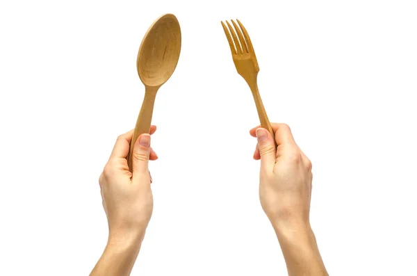 Hand of young girl holding spoon and fork. — Stock Photo, Image