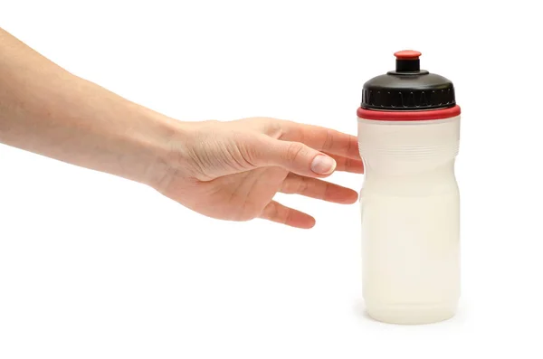 Mano de niña sosteniendo deporte botella de agua . — Foto de Stock