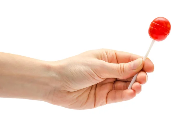 Γυναίκα χέρι κρατά lollipop candy. — Φωτογραφία Αρχείου