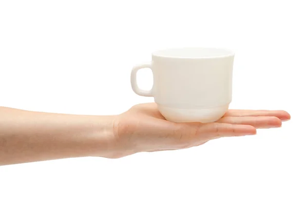 Mano de mujer sosteniendo taza blanca . — Foto de Stock