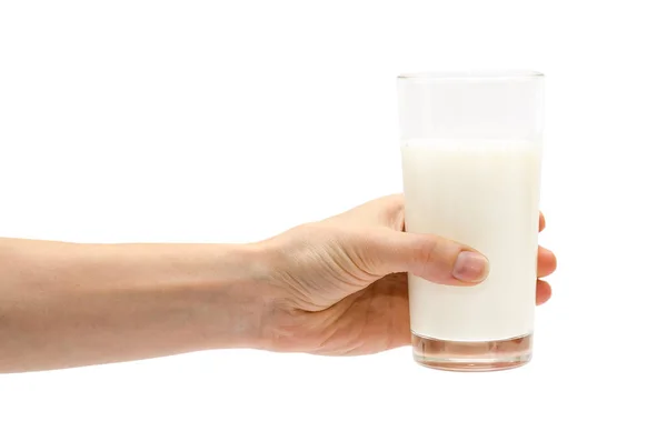 Woman hand holding glass of milk. — Stock Photo, Image