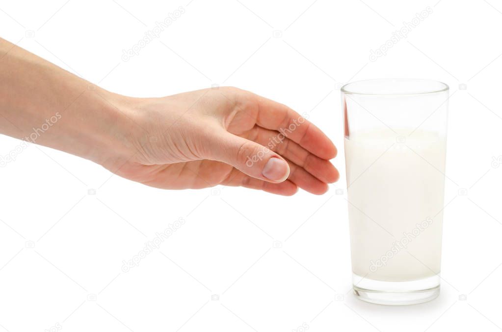 woman hand holding glass of milk.