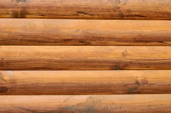 Background from boards of solid wood, brown color — Stock Photo, Image