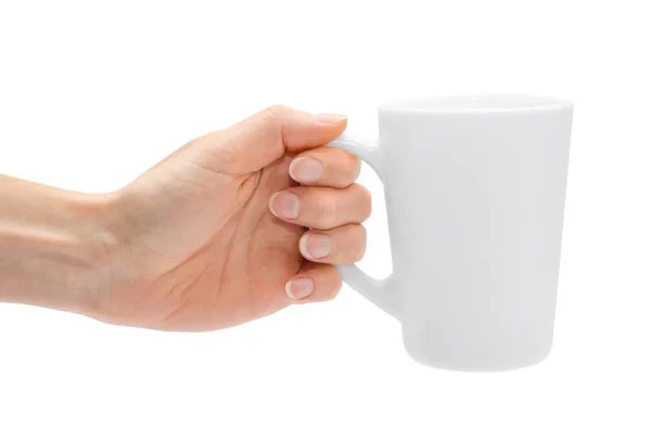 Mano de mujer sosteniendo taza blanca . — Foto de Stock