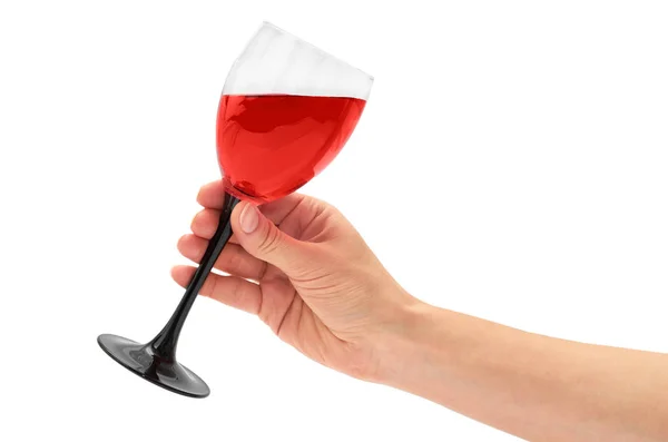 Female hand holds red Wine in glass. Isolated on white background — Stock Photo, Image