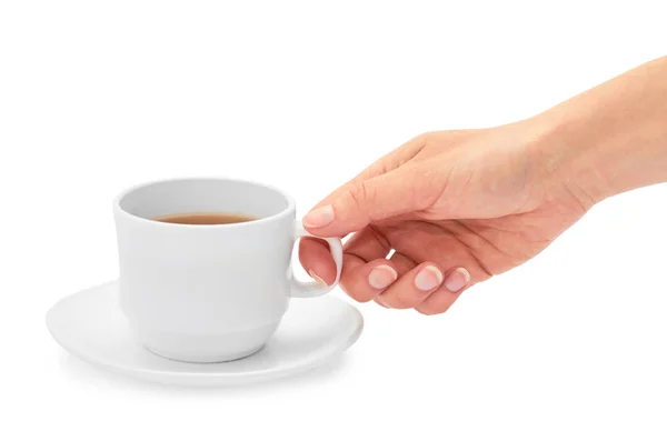 La mano femenina sostiene una taza de té. Aislado sobre fondo blanco — Foto de Stock