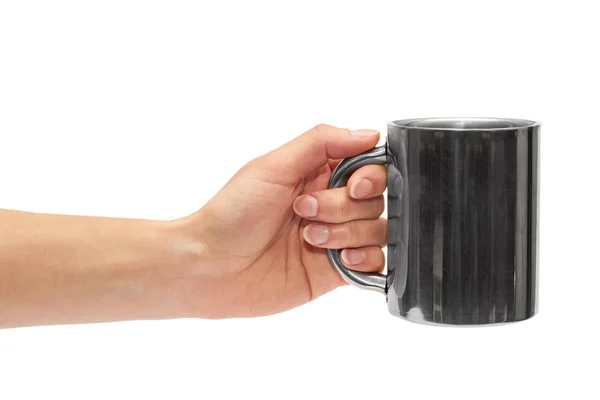 Female hand holding metal camping mug for drinking — Stock Photo, Image