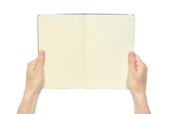 Hermosa mano femenina sosteniendo el cuaderno. Aislado sobre fondo blanco — Foto de Stock