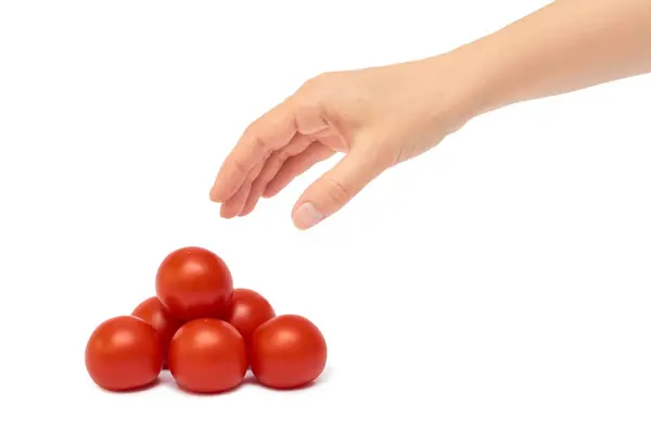 Prachtige vrouwelijke hand houdt rode tomaat gebaar. Geïsoleerd op witte achtergrond — Stockfoto