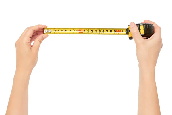 Female hands hold a tape measure to measure the size. Isolated on white background — Stock Photo, Image