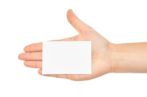 Las manos femeninas tienen una tarjeta de visita. Aislado sobre fondo blanco — Foto de Stock