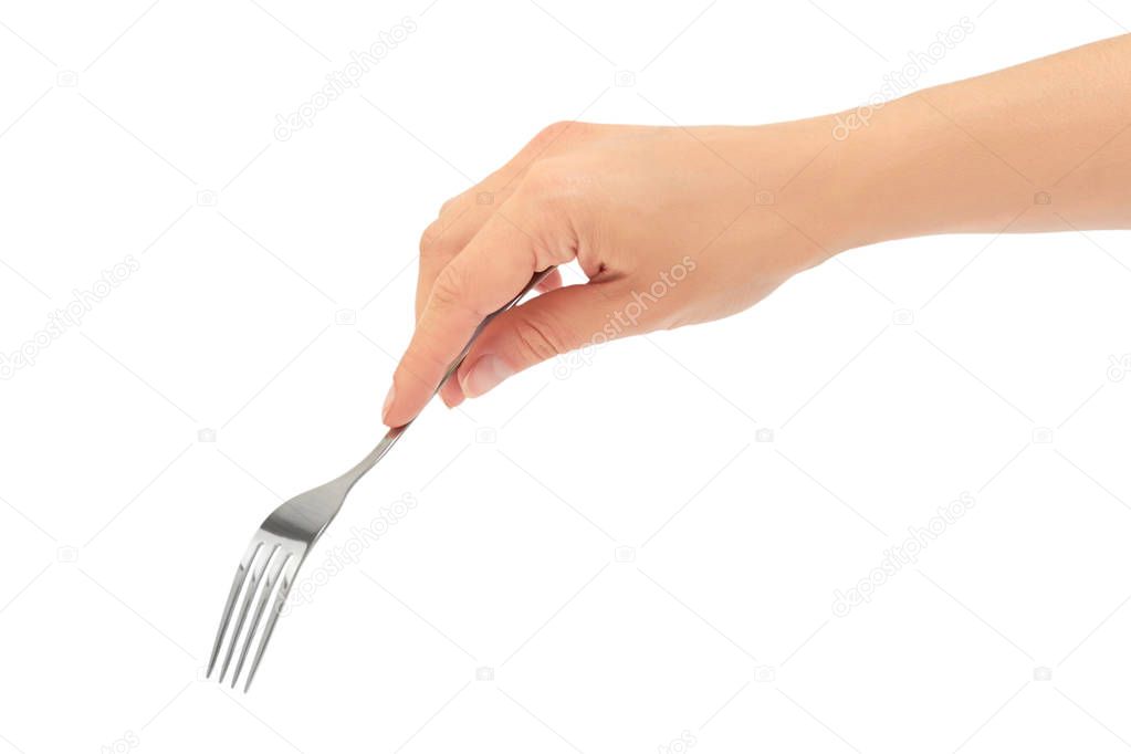 Female hands hold a fork. Isolated on white background