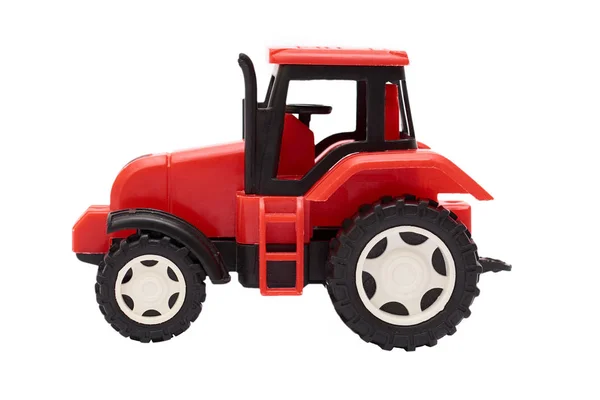 Tractor de juguete rojo aislado sobre fondo blanco — Foto de Stock