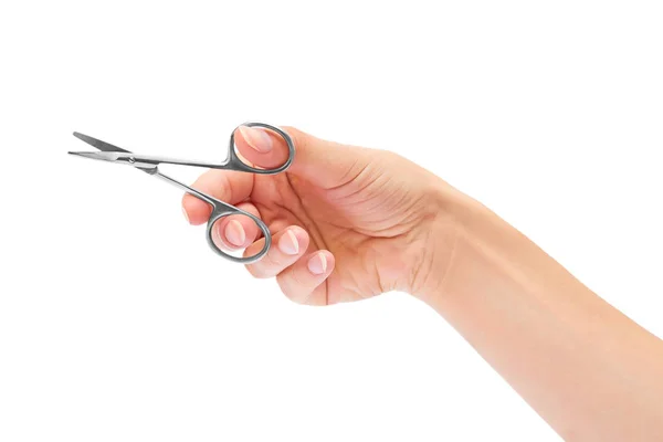Nożyczki w ręku na białym tle do manicure — Zdjęcie stockowe