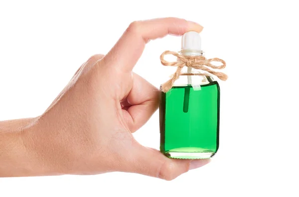 Garrafa de óleo aroma eco na mão isolado no fundo branco — Fotografia de Stock
