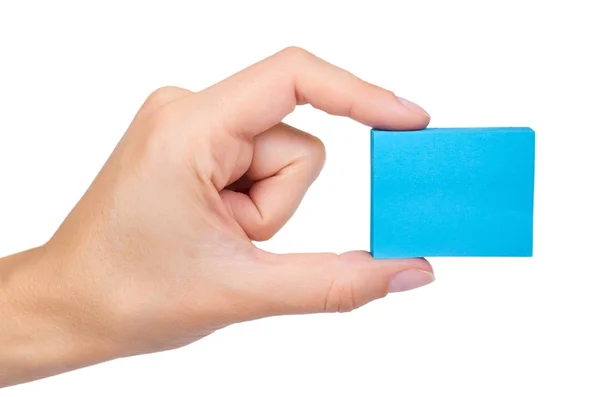 Blauer Notizblock in der Hand isoliert auf weißem Hintergrund — Stockfoto