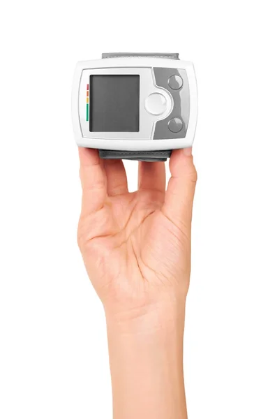 Equipamento de medição da pressão arterial tensiômetro na mão isolado em fundo branco — Fotografia de Stock