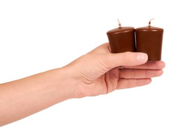 Aromatik kahverengi el izole üzerinde beyaz arka plan mumlar