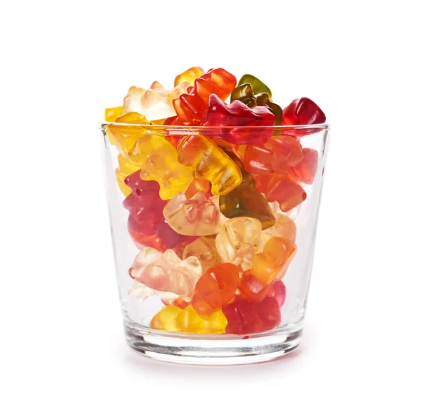 Childhood and jelly bears candies in glass cup isolated on white background — Stock Photo, Image