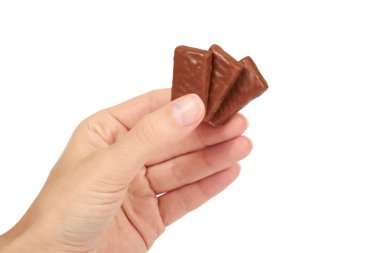 gurme çikolata beyaz arka plan üzerinde ev yapımı tatlılar, sağlıksız yiyecek izole elinde