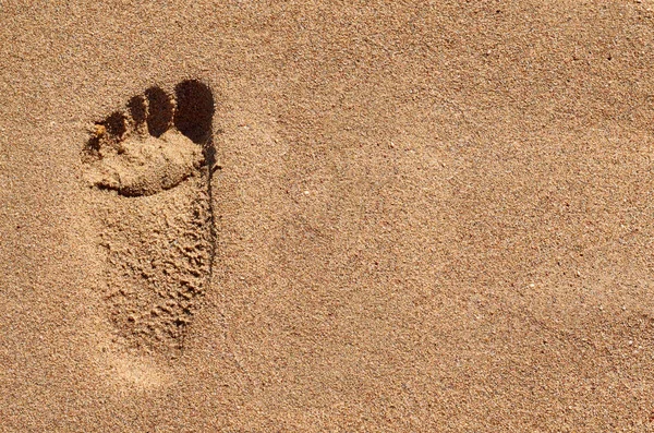 砂の足跡。海ビーチ、休暇のアイデア — ストック写真