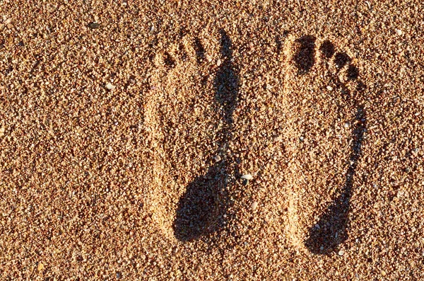 砂の足跡。海ビーチ、休暇のアイデア — ストック写真