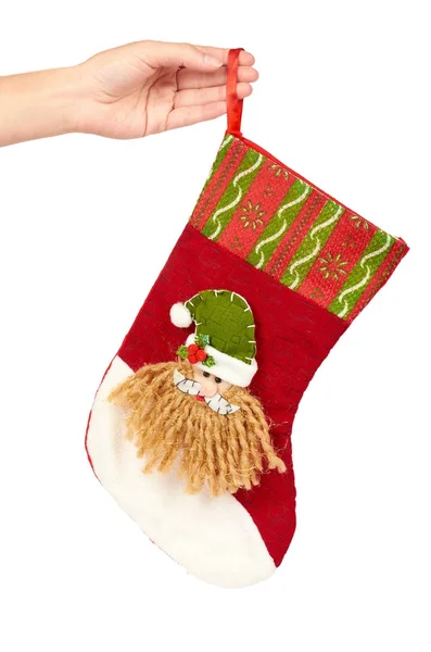 Різдвяні прикраси, подарунковий шкарпетка в руці ізольовані на білому тлі. Новорічний об'єкт — стокове фото