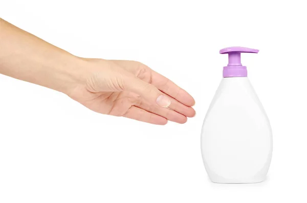 White hand sanitizer soap dispenser in hand isolated on white background. Housework and sanitary concept — Stock Photo, Image