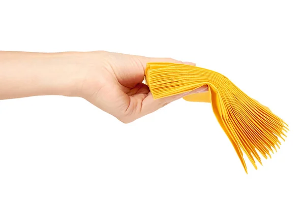 Guardanapo de papel amarelo para alimentos na mão isolado em fundo branco. Cozinha servindo objeto . — Fotografia de Stock