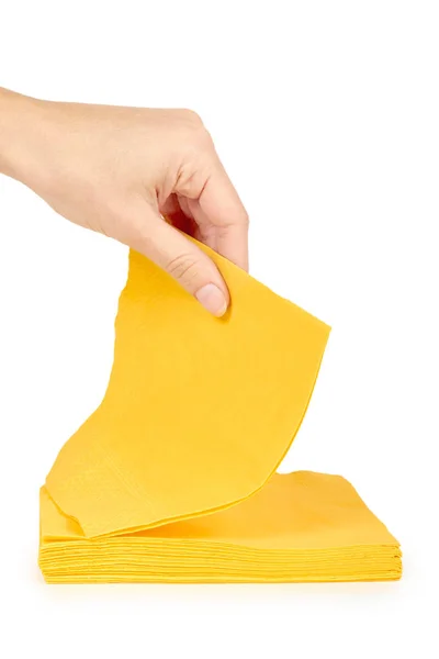 Gelbe Papierserviette für Lebensmittel in der Hand isoliert auf weißem Hintergrund. Küchendiensobjekt. — Stockfoto