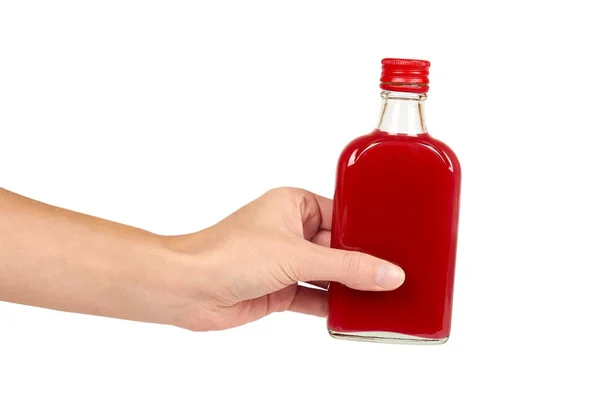 Flacon en verre avec teinture rouge à la main isolé sur fond blanc. Problème d'alcool — Photo