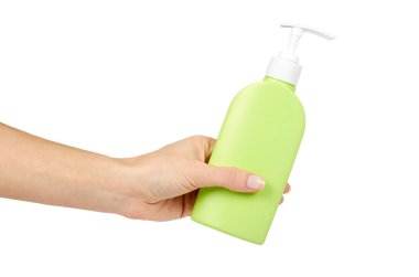 Yeşil şişe Sabunluk elinde beyaz arka plan üzerinde izole