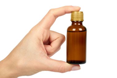 Sağlık iksiri, soğuk algınlığı şurubu, elinde antipiretik süspansiyon ile şişe. Beyaz arka plan üzerinde izole. Sağlık ve tıp