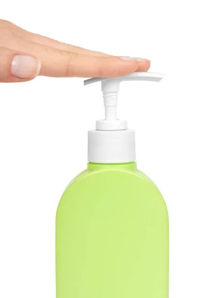 Green soap bottle dispenser in hand, isolated on white background — Stock Photo, Image